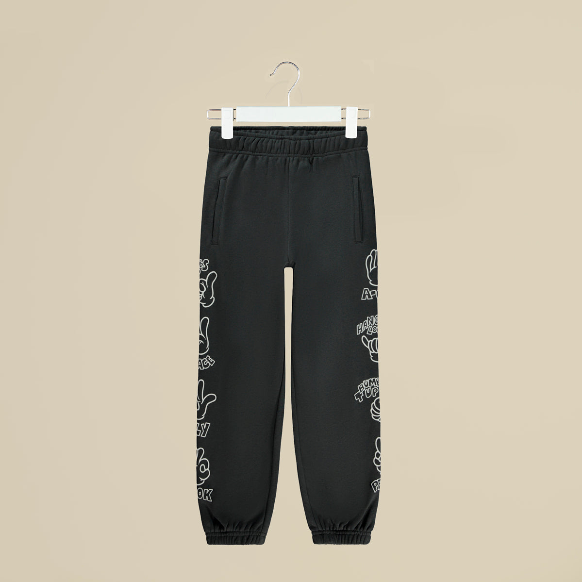 Pantalone in tuta grigia con simboli sui fianchi