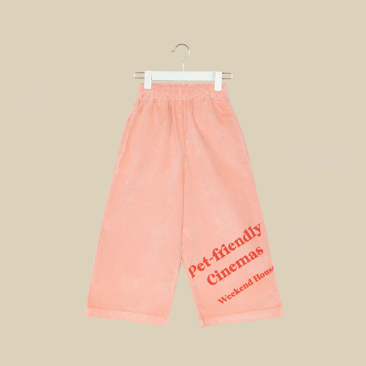 Pantalone svasato in velluto rosa chiaro