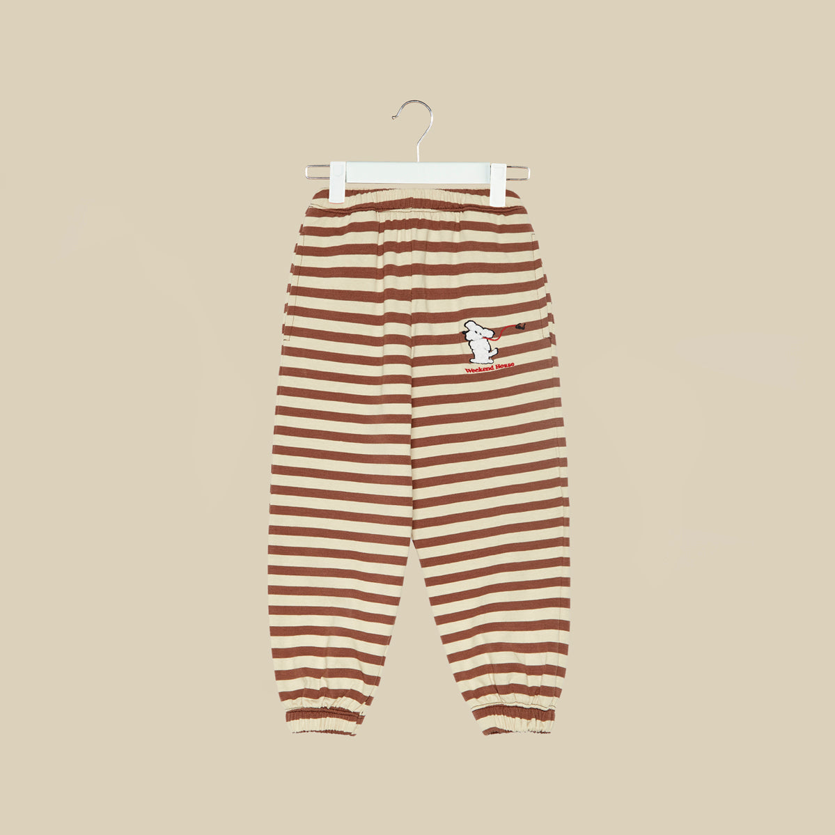 Pantalone in tuta a righe con stampa cagnolino