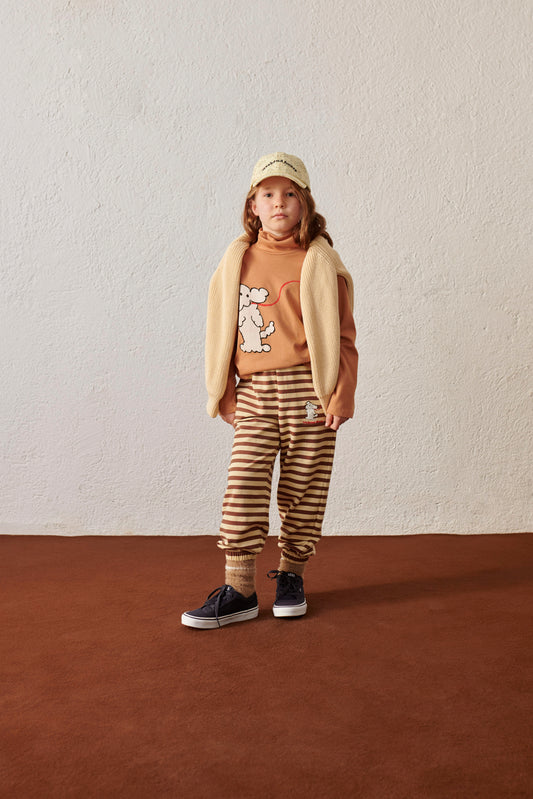 Pantalone in tuta a righe con stampa cagnolino