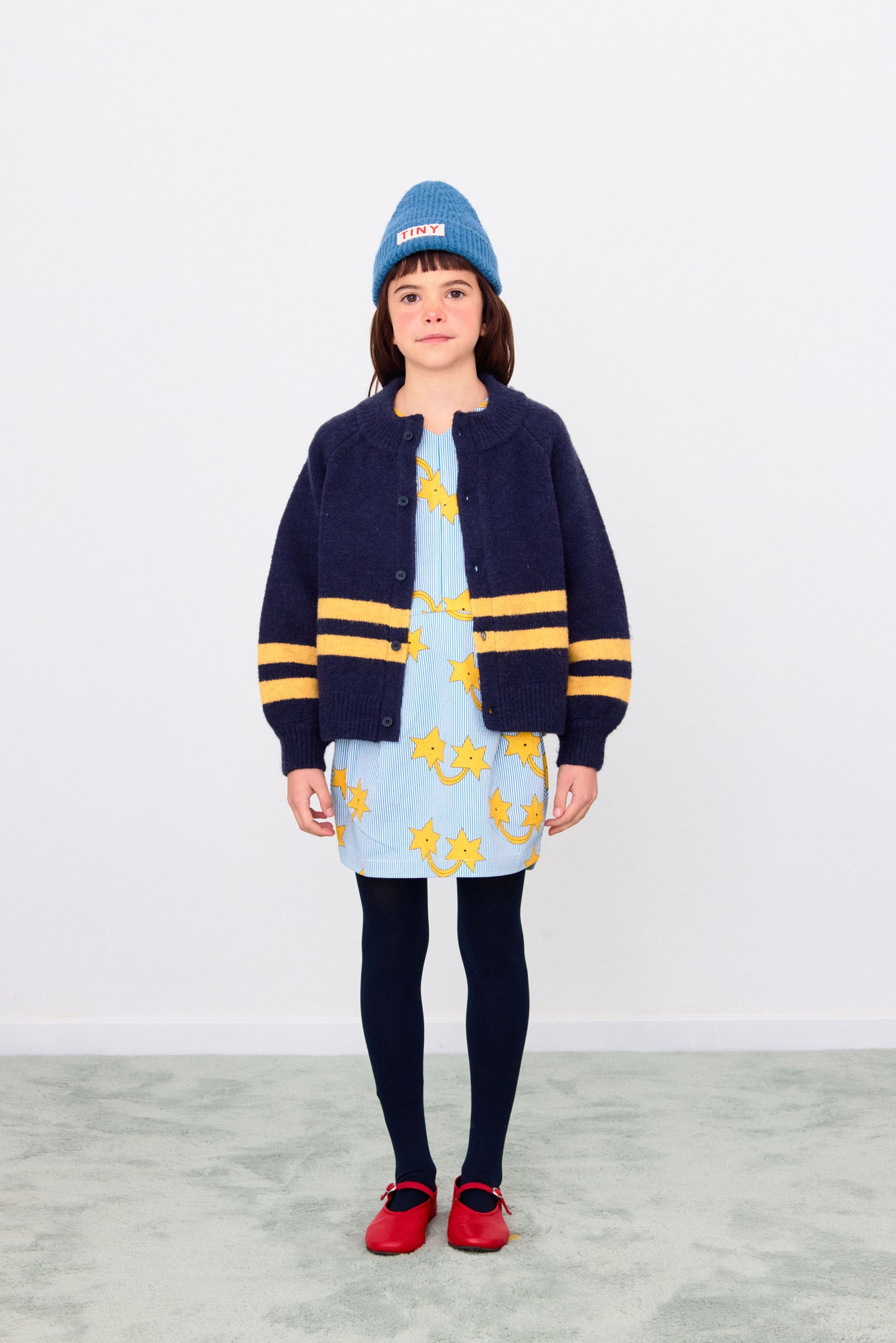 Cardigan blu navy e righe gialle