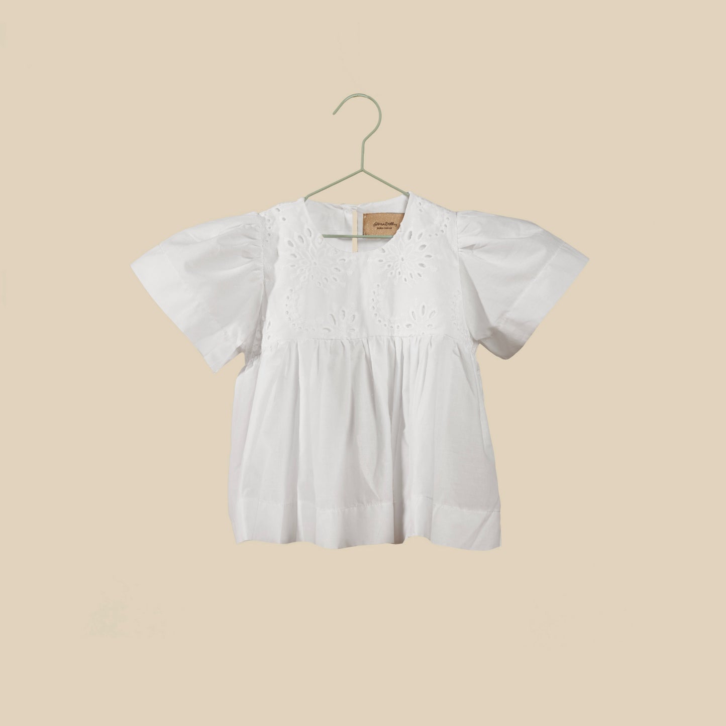 Blusa bianca in sangallo