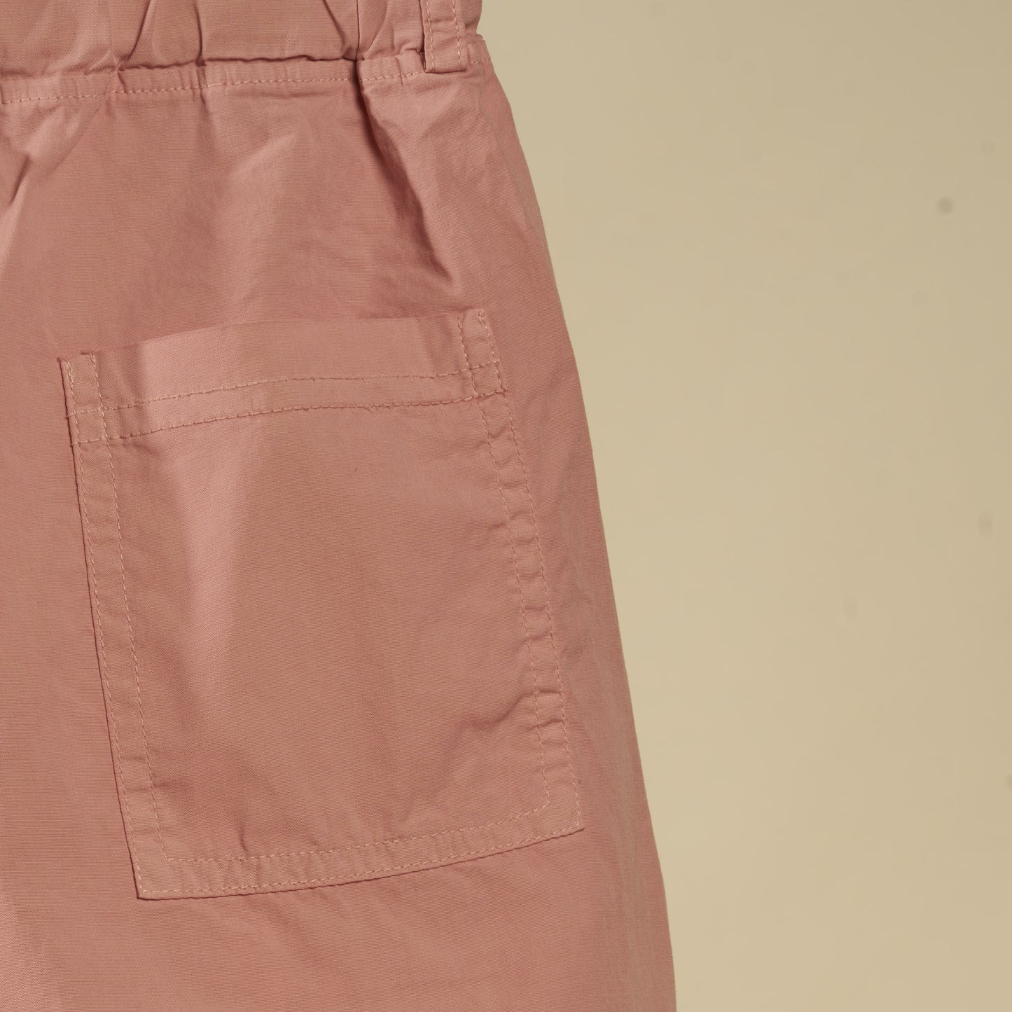 Pantalone crop a gamba larga color malva