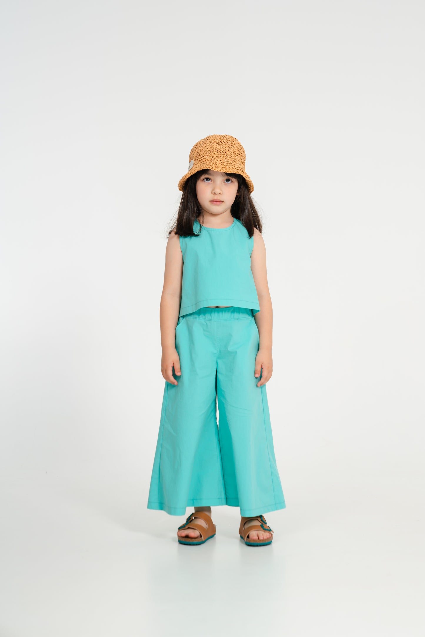 Pantalone crop a gamba larga color acqua marina