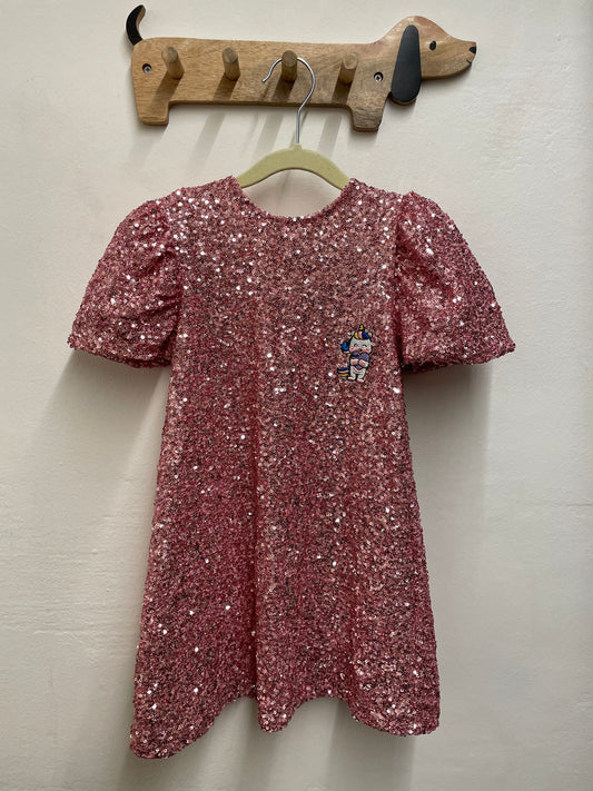 Vestito paillettes rosa con maniche a sbuffo