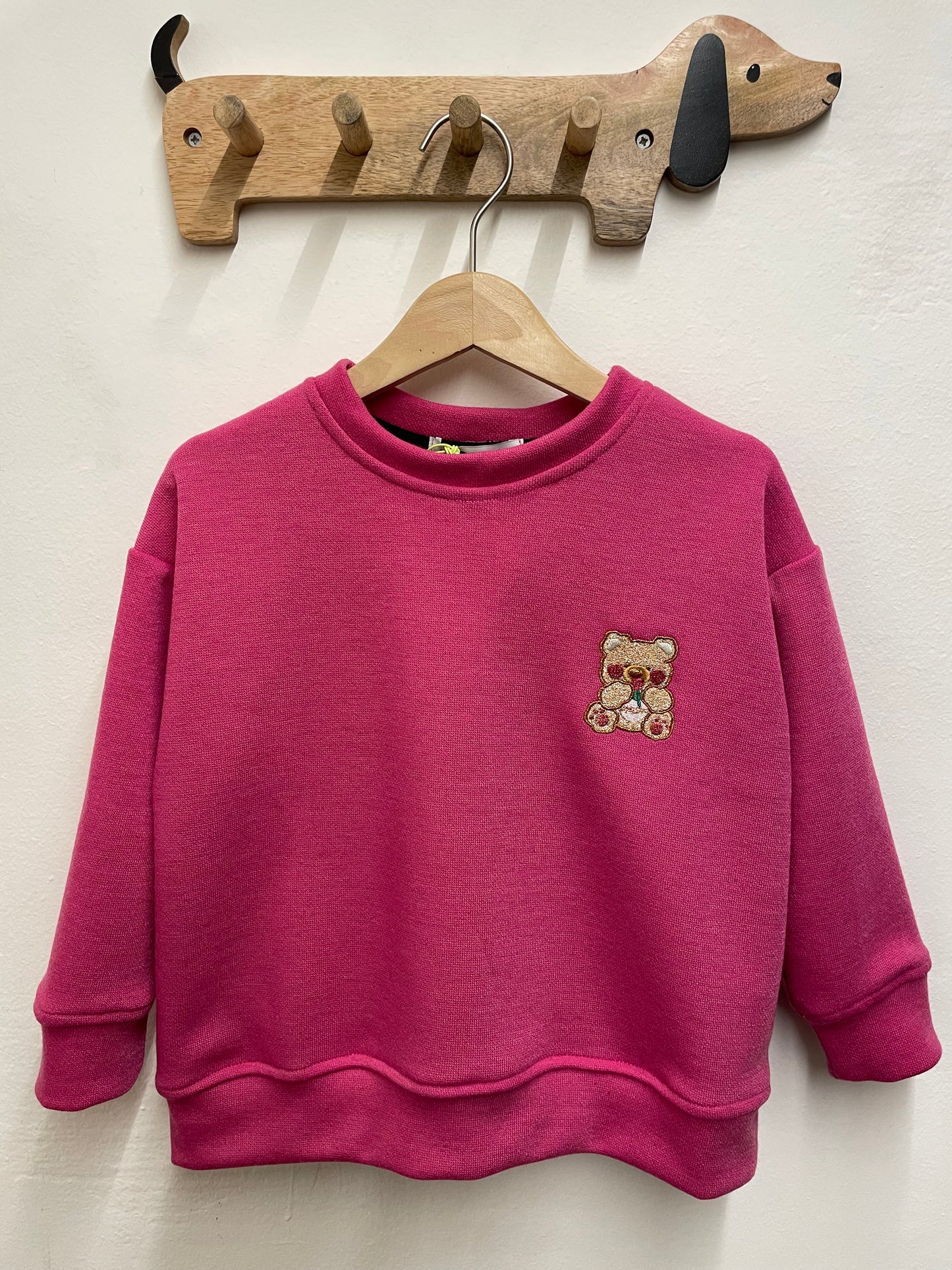Maglia in caldo cotone fuxia con orsetto