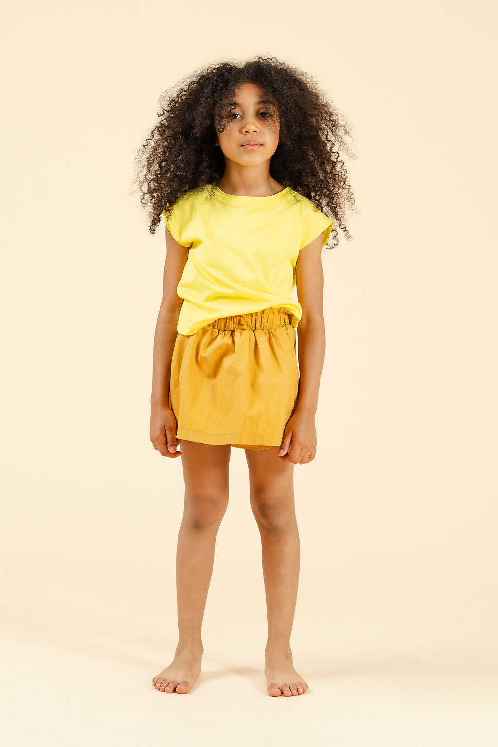 Mini panta-gonna in cotone croccante giallo