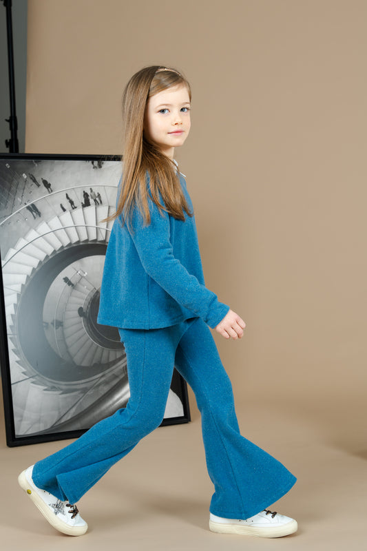 Pantalone scampanato in caldo cotone color granata