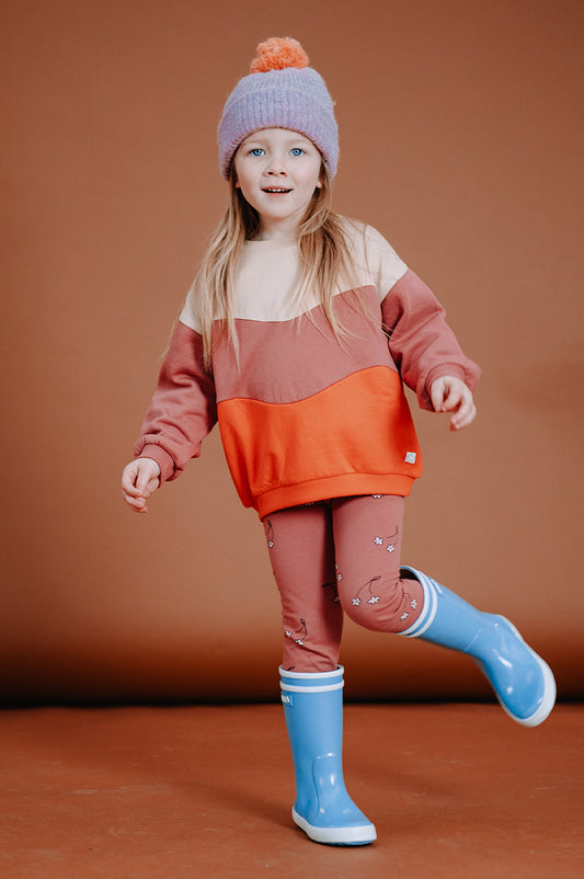 Leggings color prugna con fiorellini di ciliegio