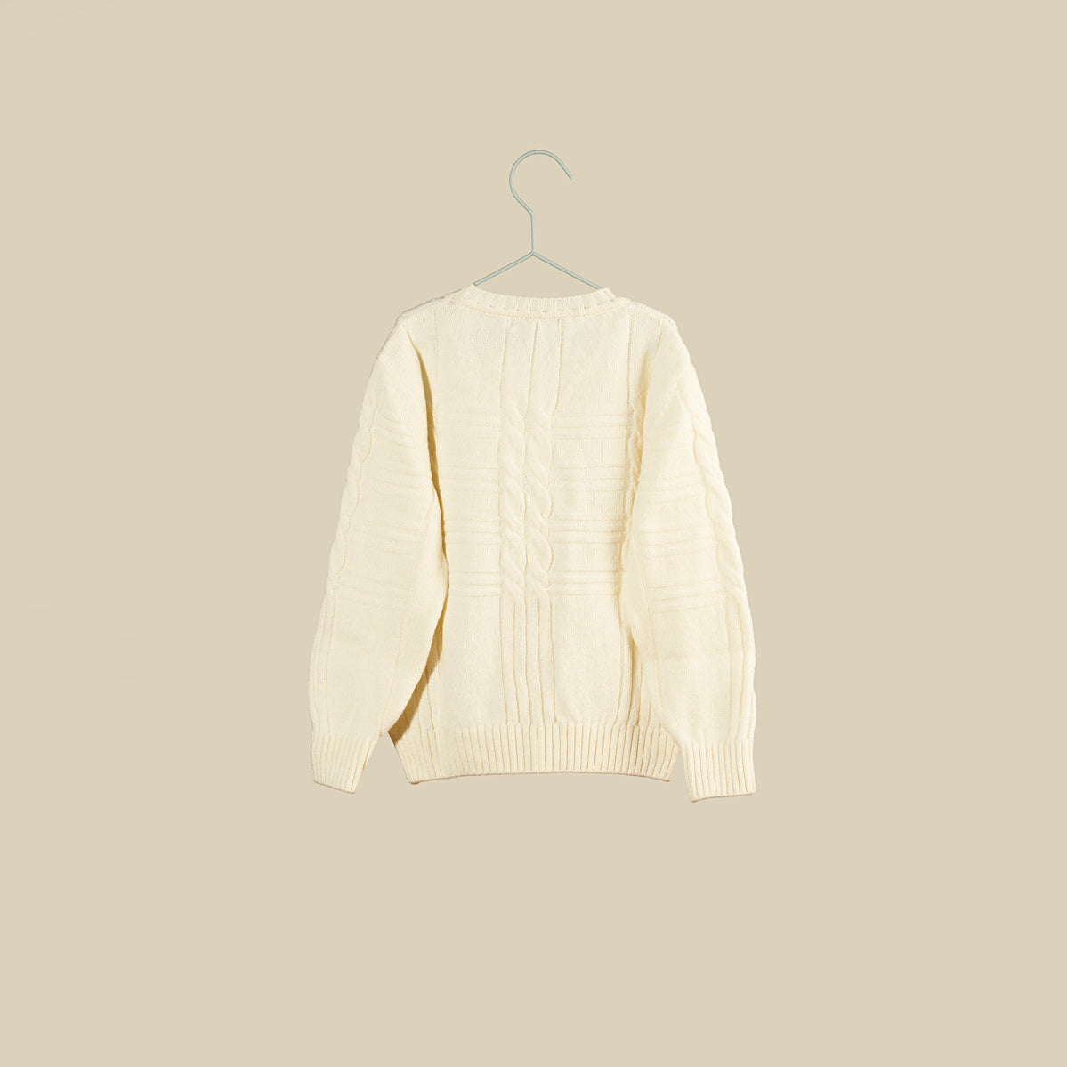 Maglione bianco in lana con trecce