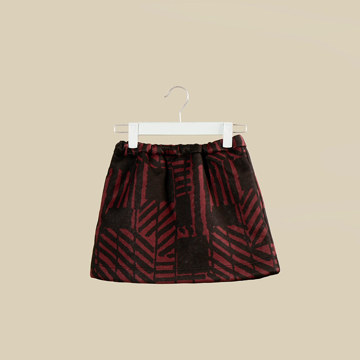 Gonna corta bordeaux con elastico in vita