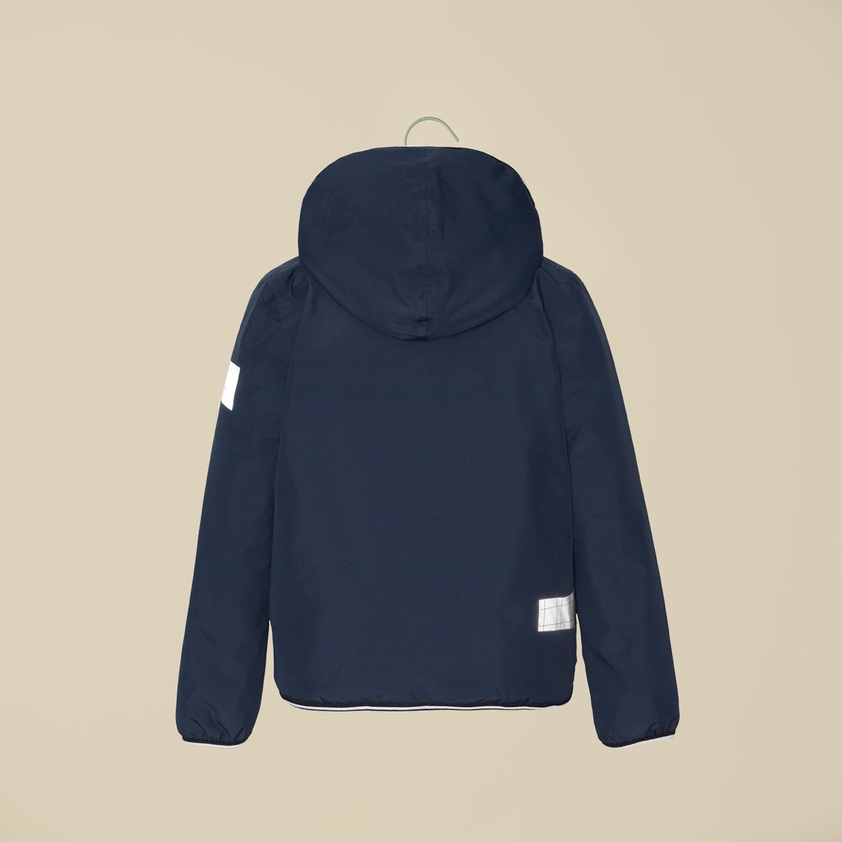 Piumino imbottito blu con cappuccio e zip