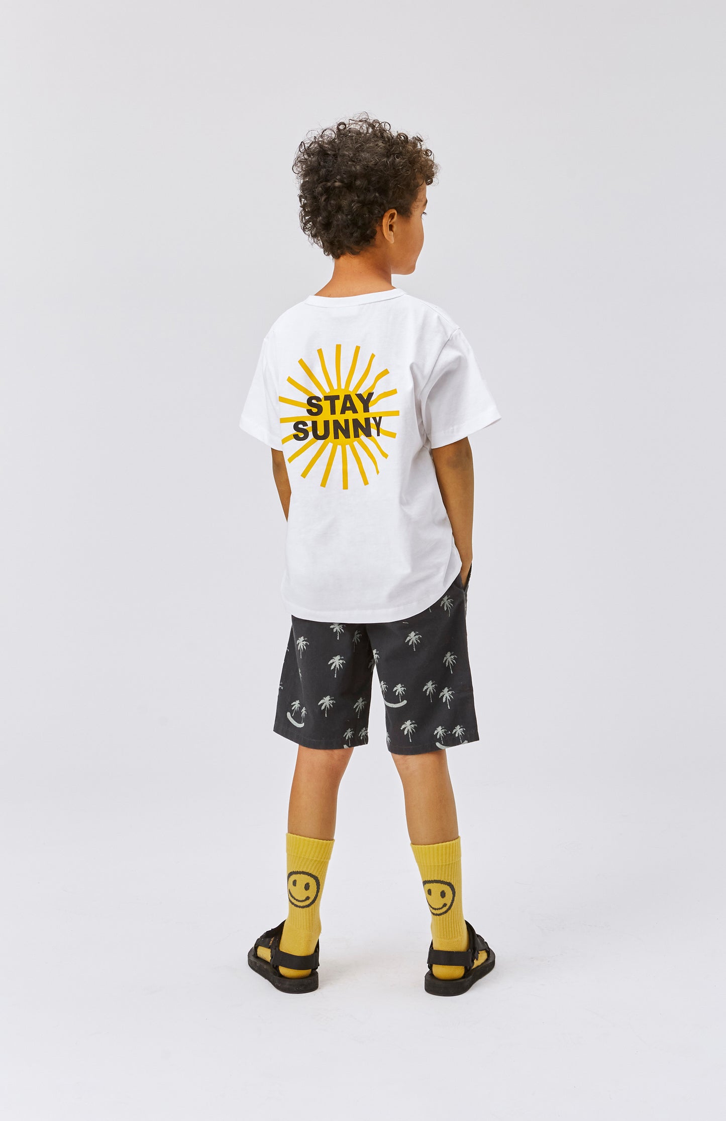 Shorts neri con palme verdi