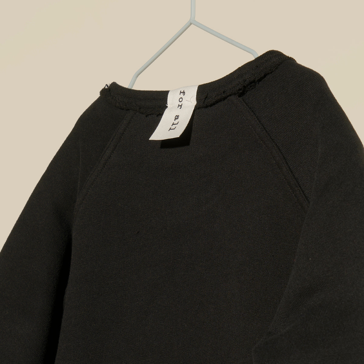 Maglia felpata nera reversibile
