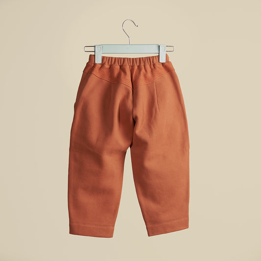 Pantalone ampio con tascone color coccio