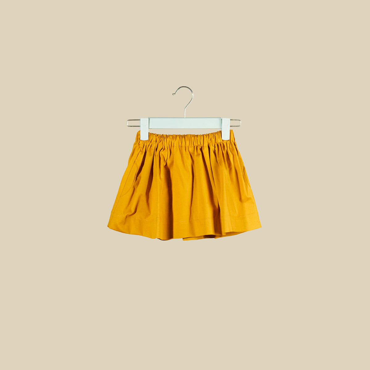 Gonna corta in tessuto gabardine giallo ocra