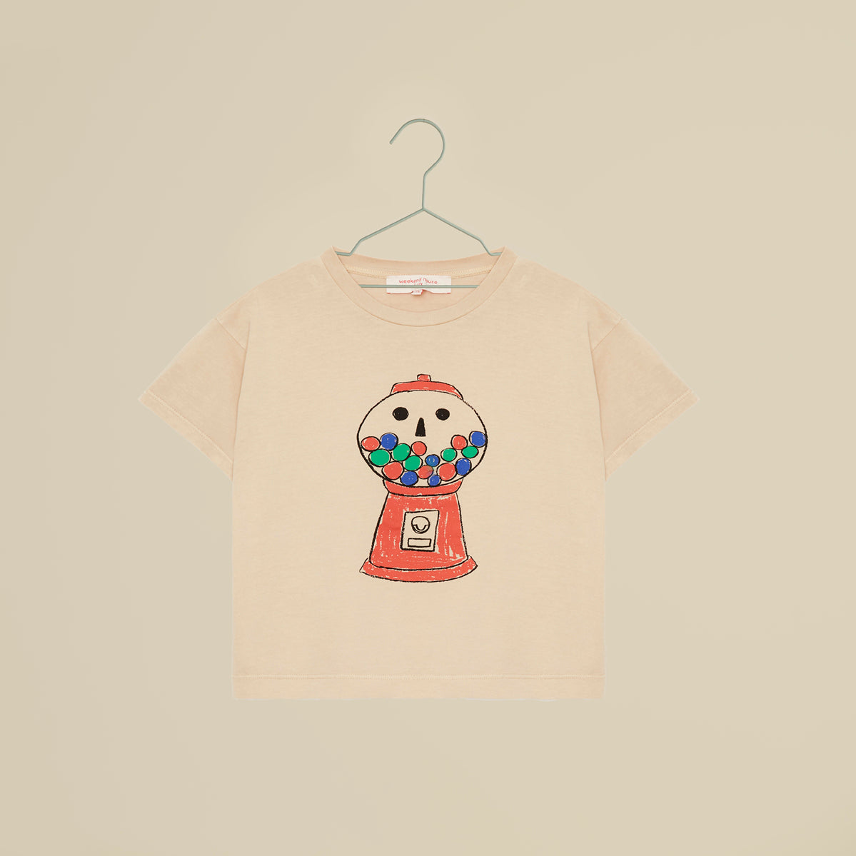 T-shirt beige a maniche corte con distributore di cicche