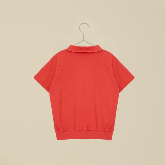 Polo maniche corte rossa con stampa davanti