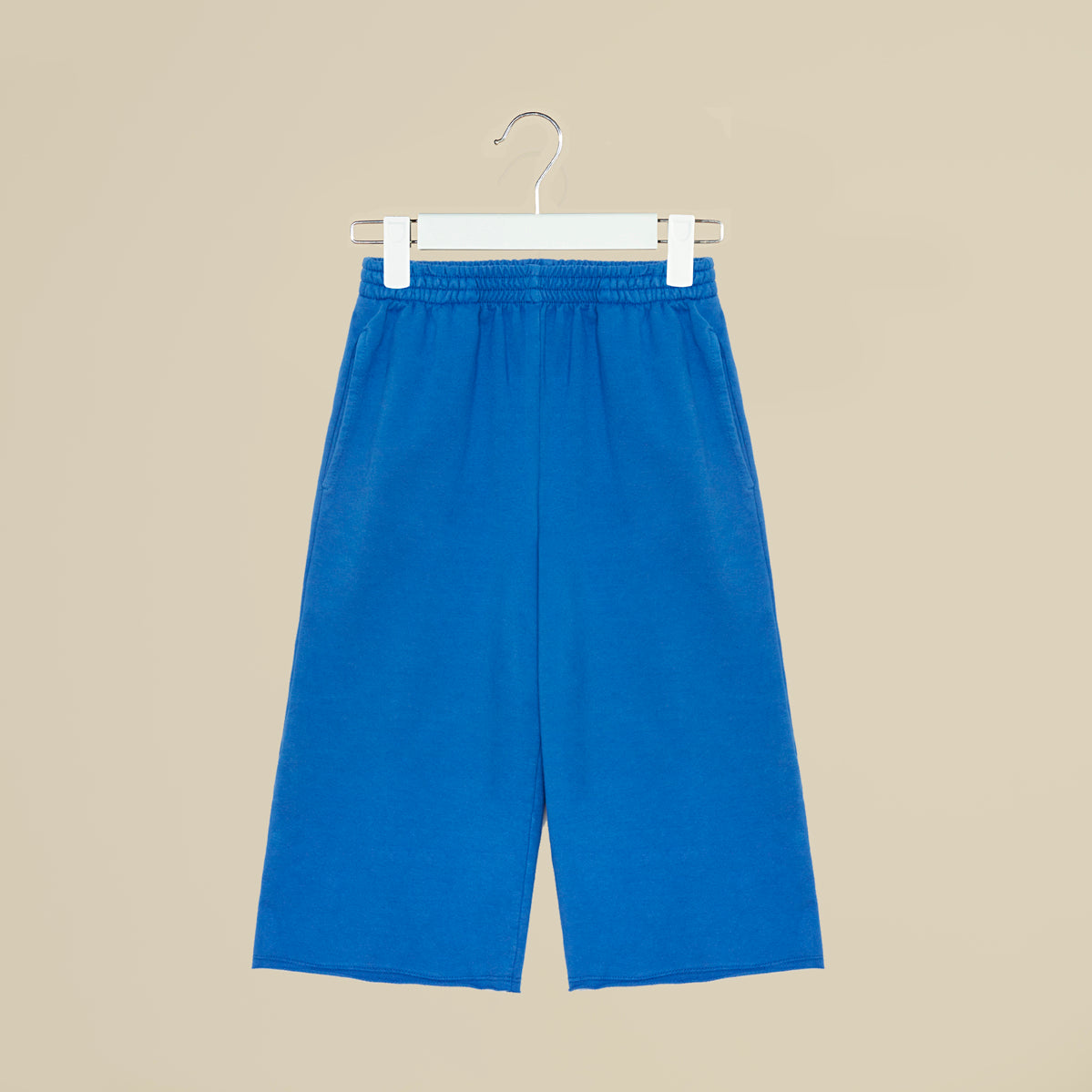 Pantalone crop in tuta blu elettrico