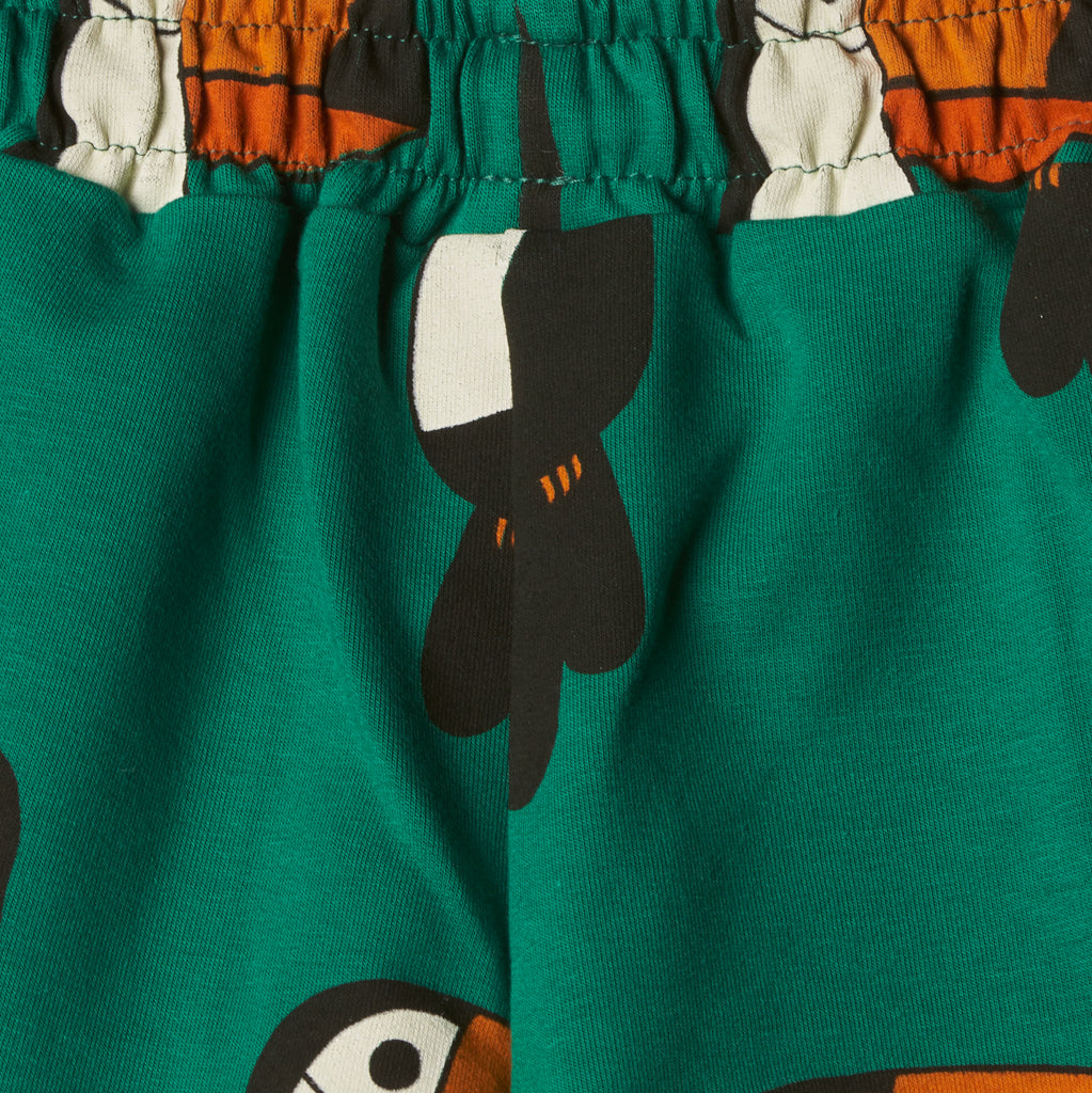 Shorts in cotone verde con stampe "Tucano"
