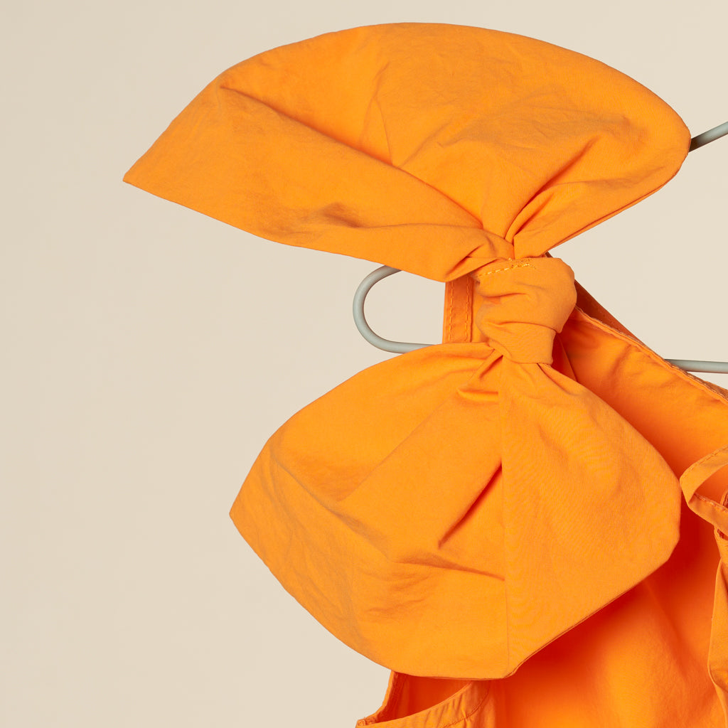 Top smanicato arancio