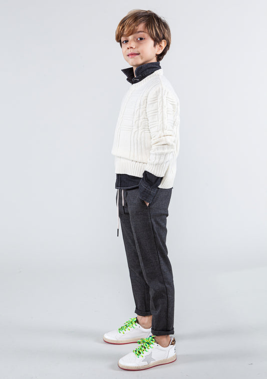 Maglione bianco in lana con trecce