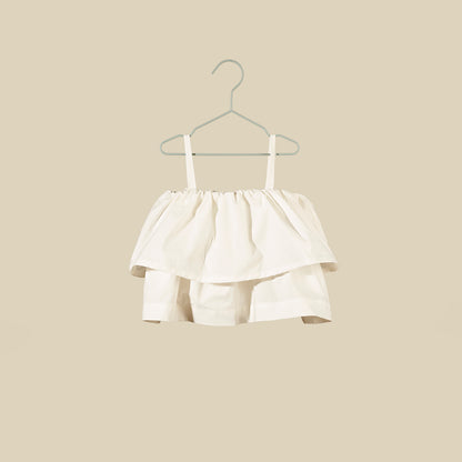 Top bianco con spalline sottili e balze