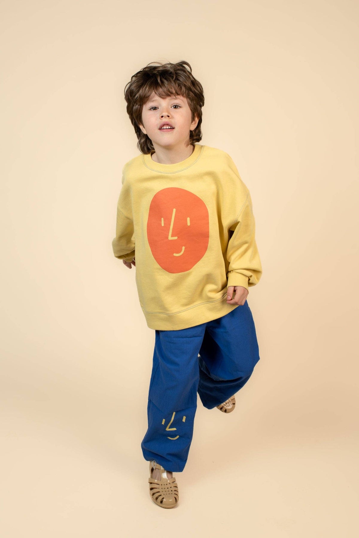 Pantaloni blu elettrico con faccia