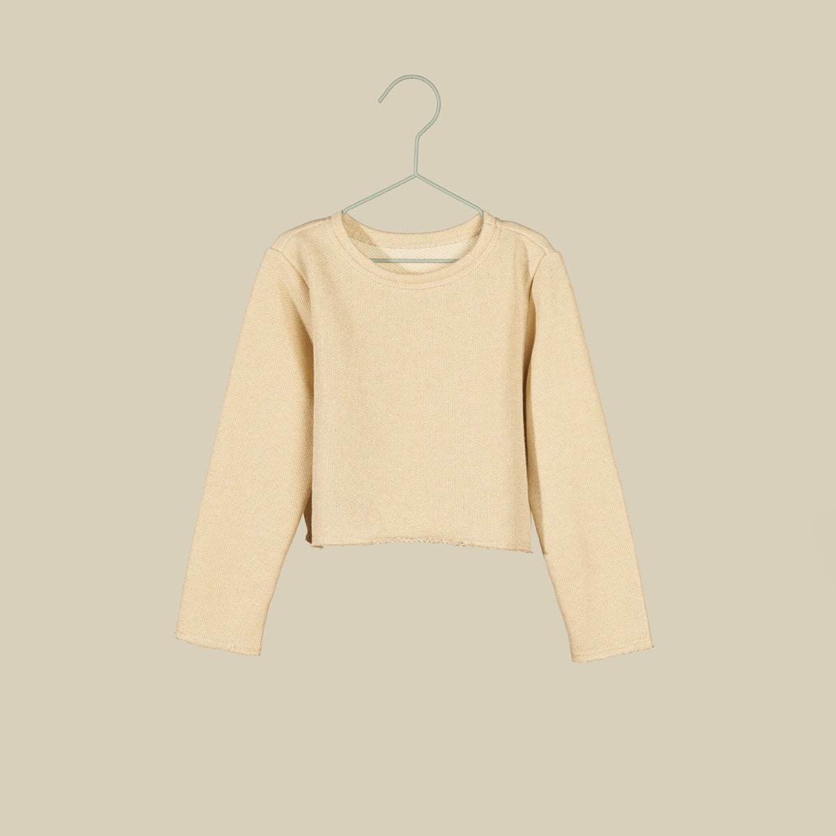 Felpa in lurex oro con spacco sul retro