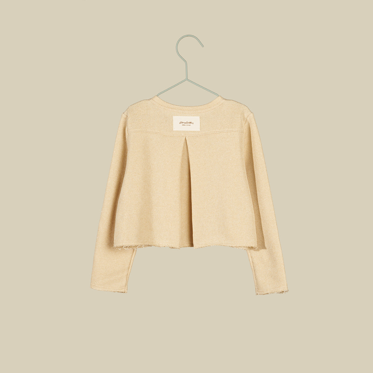 Felpa in lurex oro con spacco sul retro