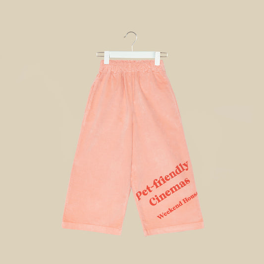 Pantalone svasato in velluto rosa chiaro