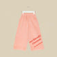 Pantalone svasato in velluto rosa chiaro