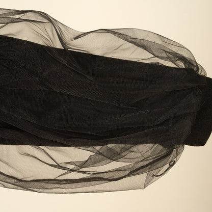 Maglia in caldo cotone nera con maniche in tulle