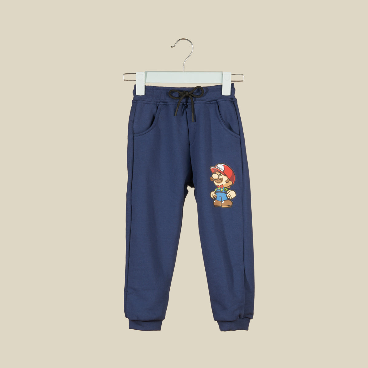 Pantalone jogger in tuta blu con Super Mario