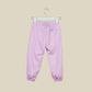 Pantalone jogger lilla con logo sul lato