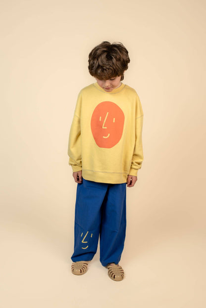 Pantaloni blu elettrico con faccia