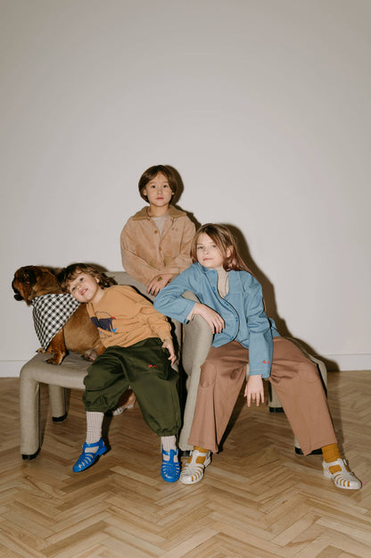 Pantaloni tabacco con toppe