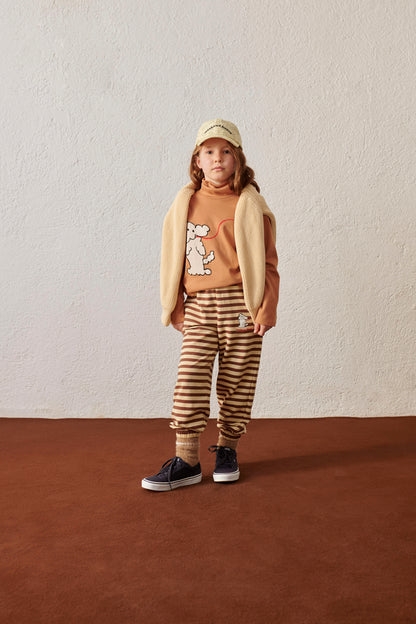 Pantalone in tuta a righe con stampa cagnolino