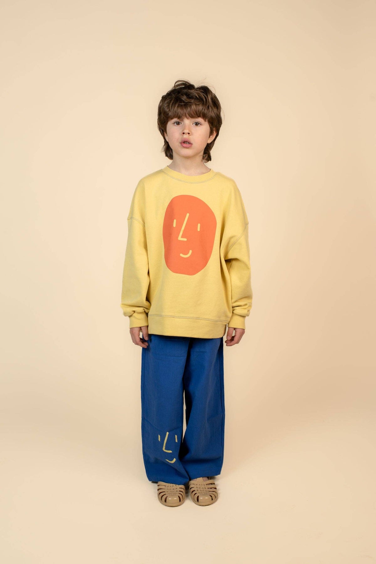 Pantaloni blu elettrico con faccia