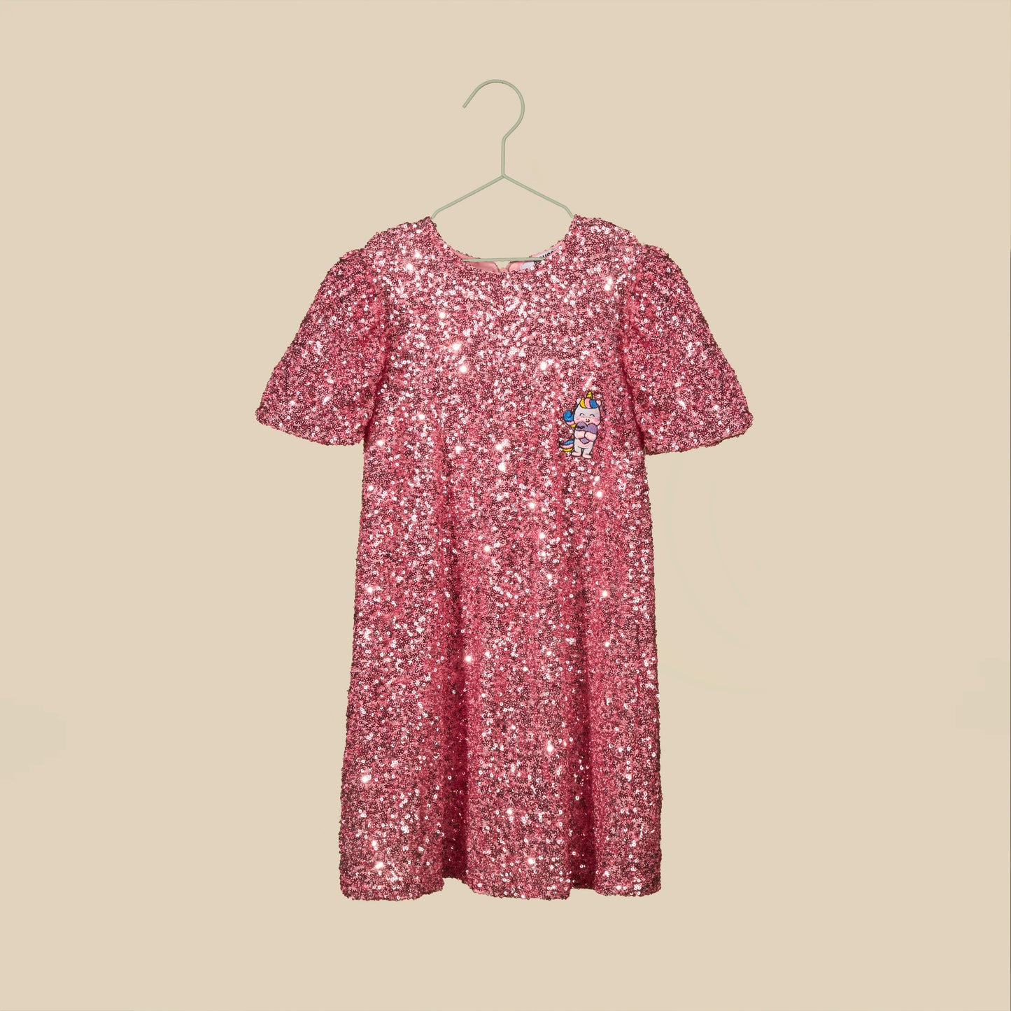 Vestito paillettes rosa con maniche a sbuffo