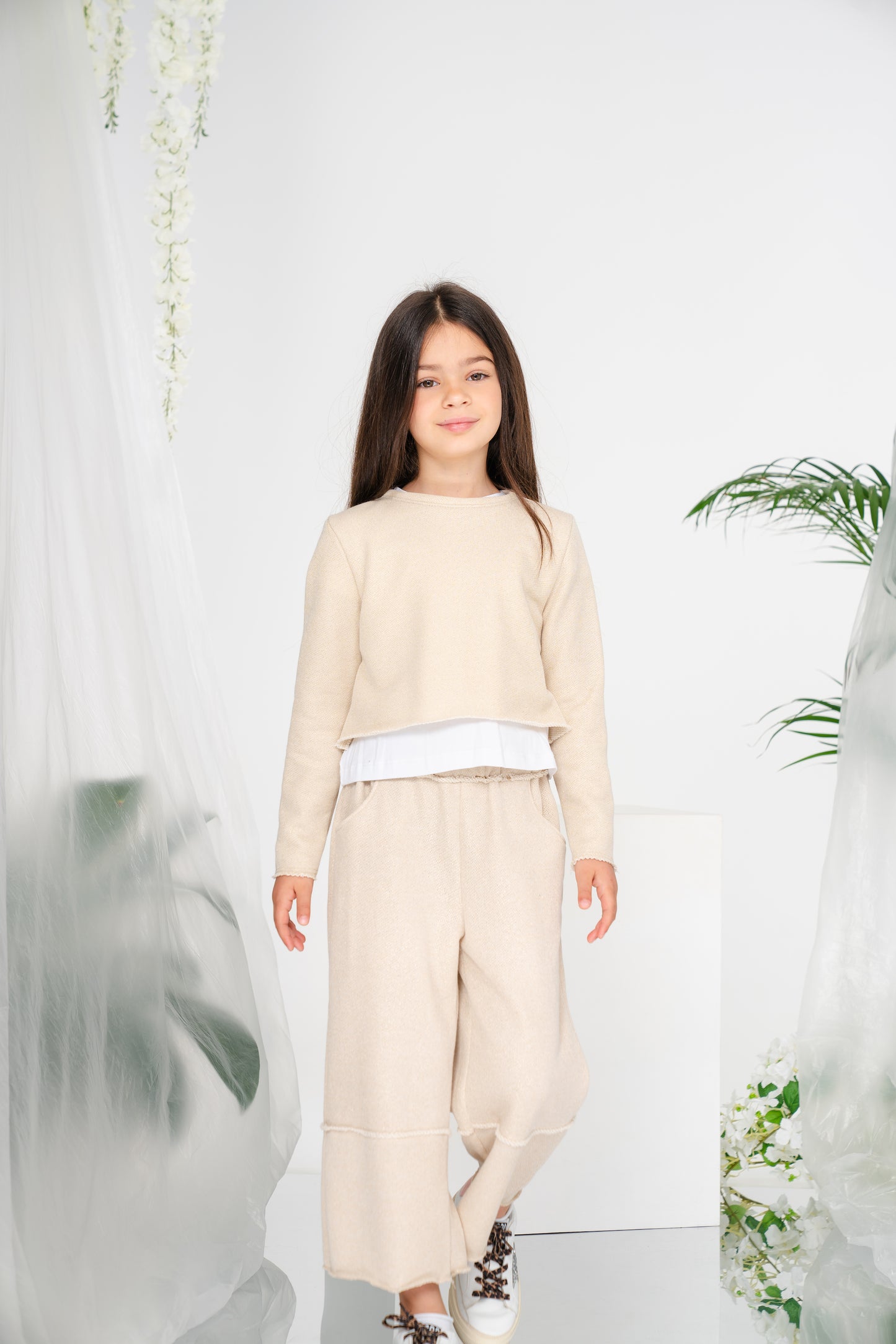 Felpa in lurex oro con spacco sul retro
