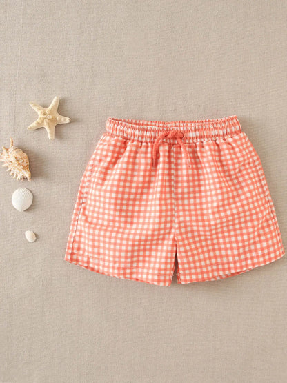 Costume boxer a quadretti arancioni e bianchi