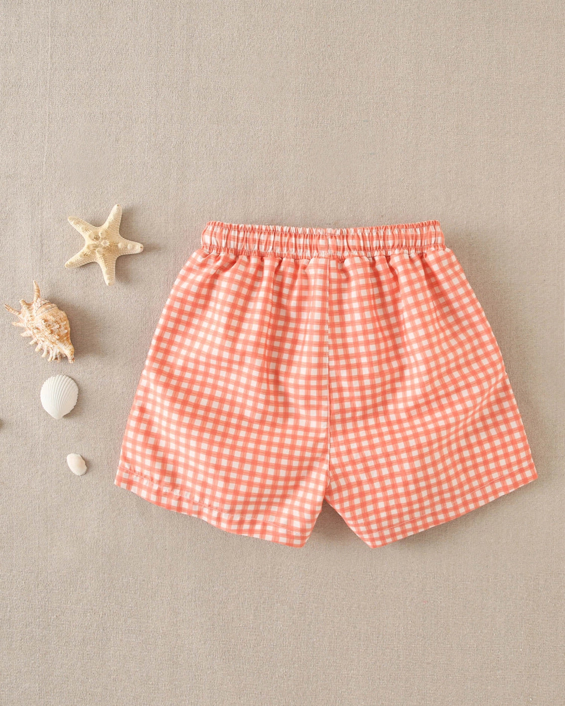 Costume boxer a quadretti arancioni e bianchi