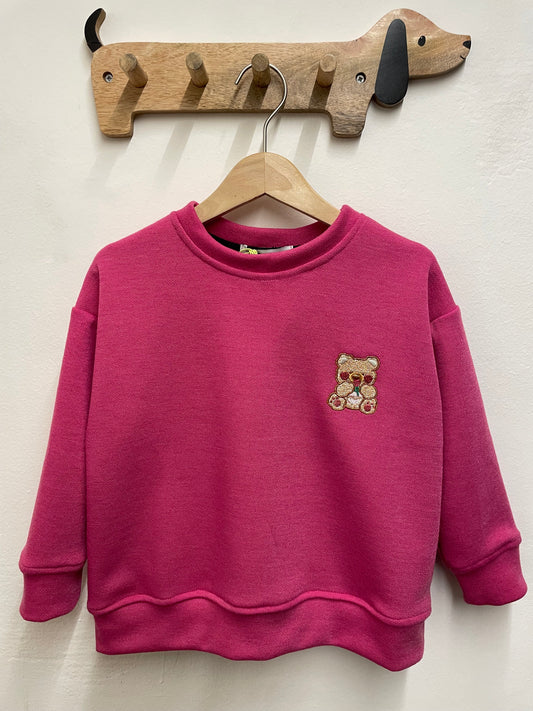 Maglia in caldo cotone fuxia con orsetto