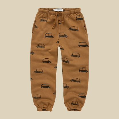 Pantaloni in tuta color biscotto con stampa macchinine