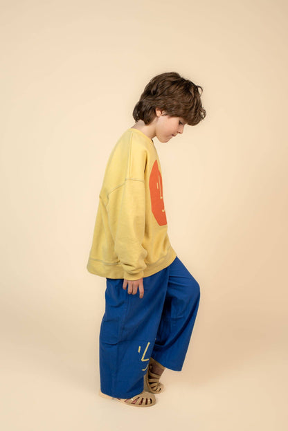 Pantaloni blu elettrico con faccia