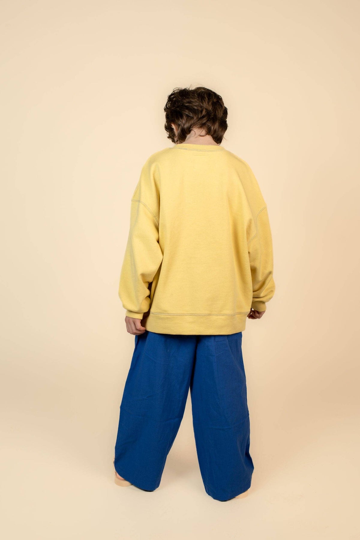 Pantaloni blu elettrico con faccia