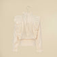 Camicia beige maniche lunghe con balze
