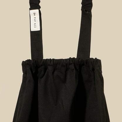 Gonna svasata con bretelline in tessuto gabardine