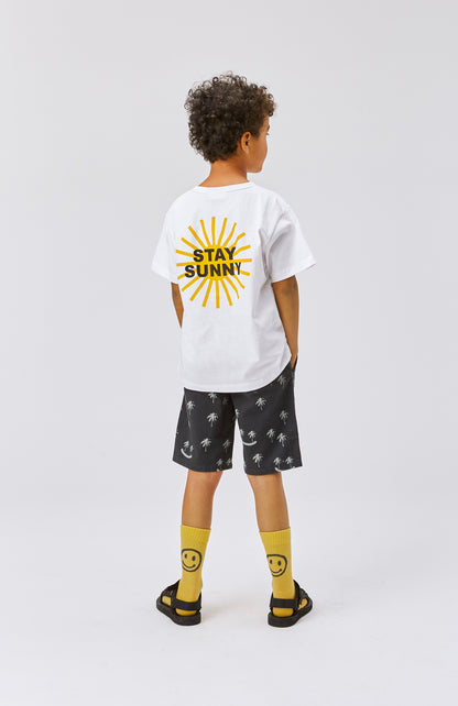 Shorts neri con palme verdi